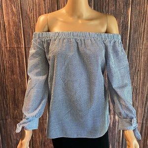 Charming Charlie’s small light blue & white vertical stripped strapless